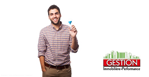 portrait of a young man holding a sand timer